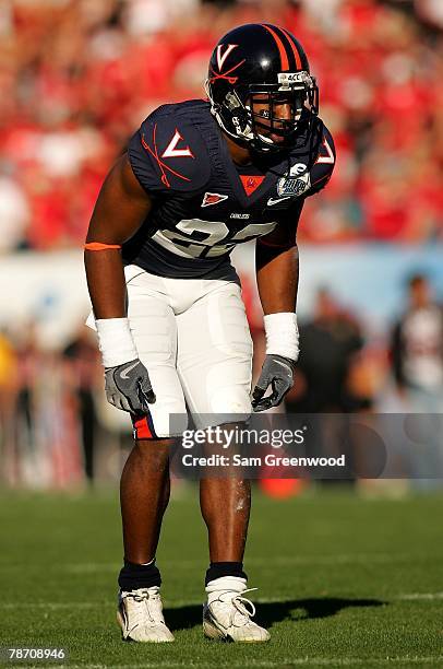 Byron Glaspy of the Virginia Cavaliers looks over the offense during the Gator Bowl against the Texas Tech Red Raiders at Jacksonville Municipal...