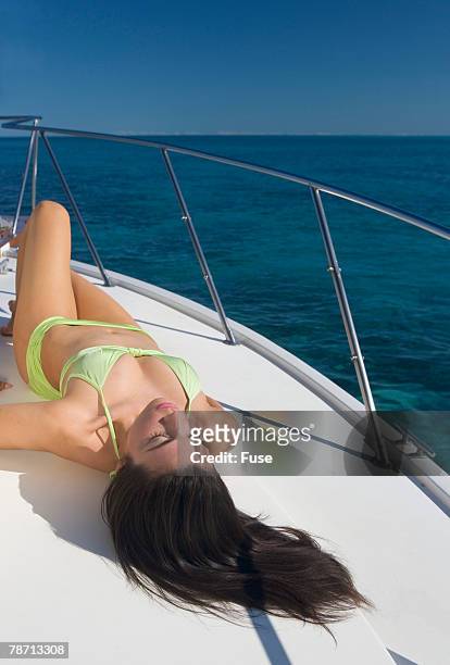 sunbathing on boat deck - bug eyes stock-fotos und bilder