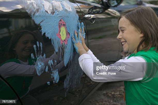 laughing girl painting car with finger paint - 4 girls finger painting bildbanksfoton och bilder