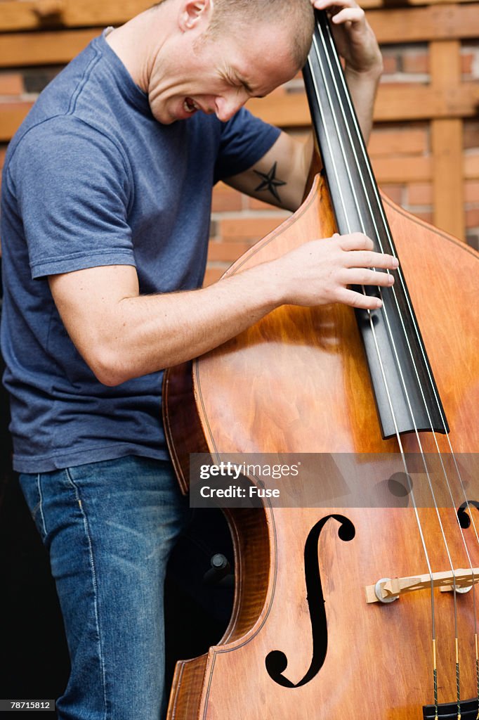 Man Playing the Double Bass