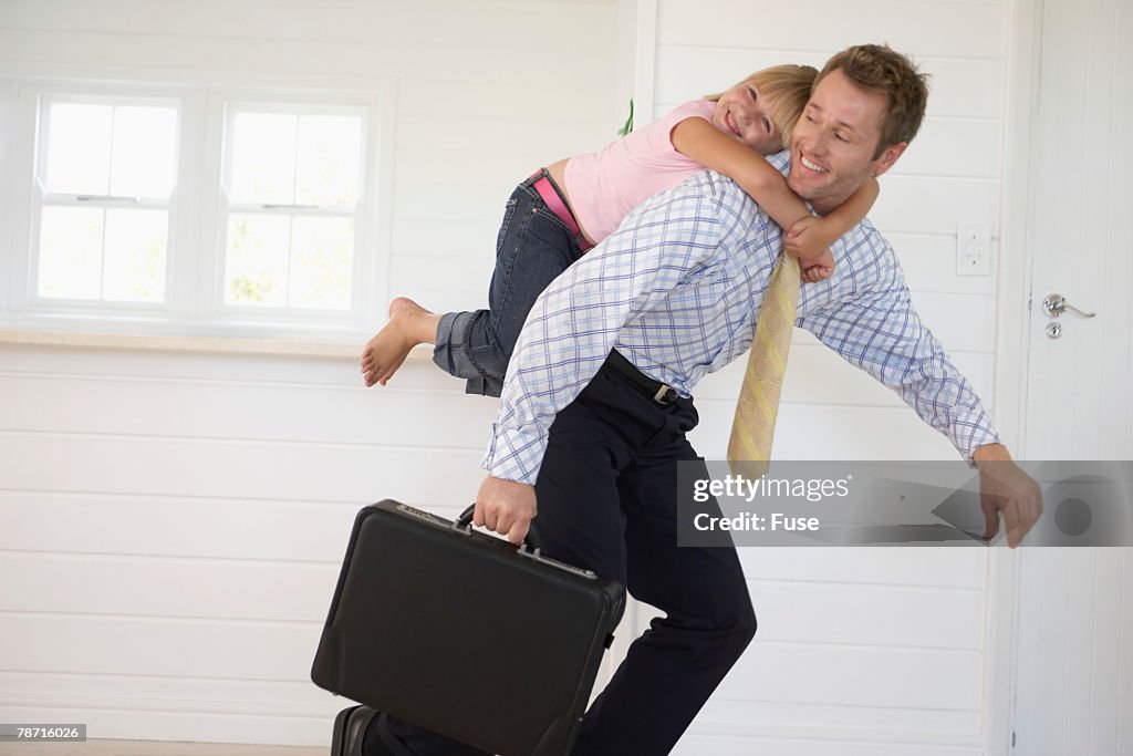 Young Girl on Her Father's Back