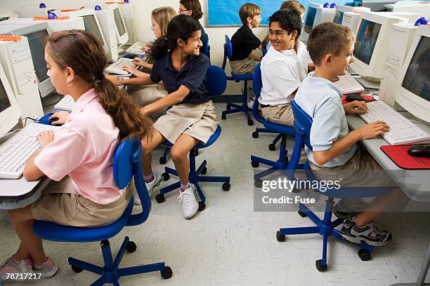 Indian Students In Computer Lab Photos and Premium High Res Pictures ...