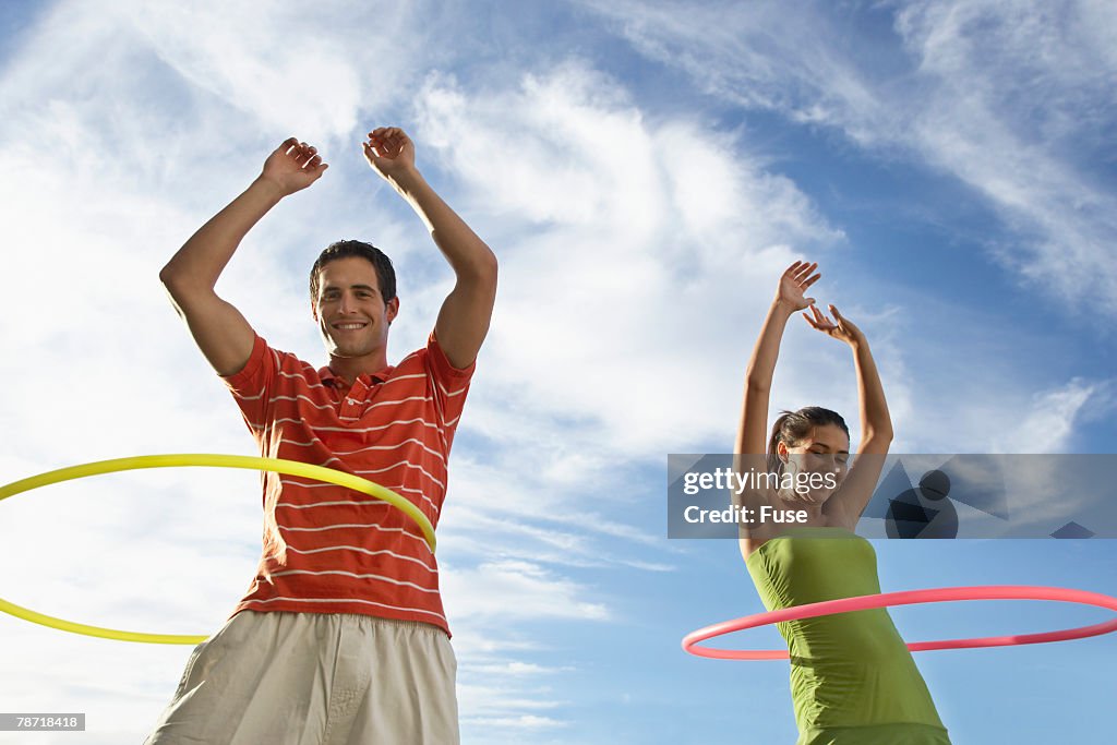 Couple Doing Hula Hoops