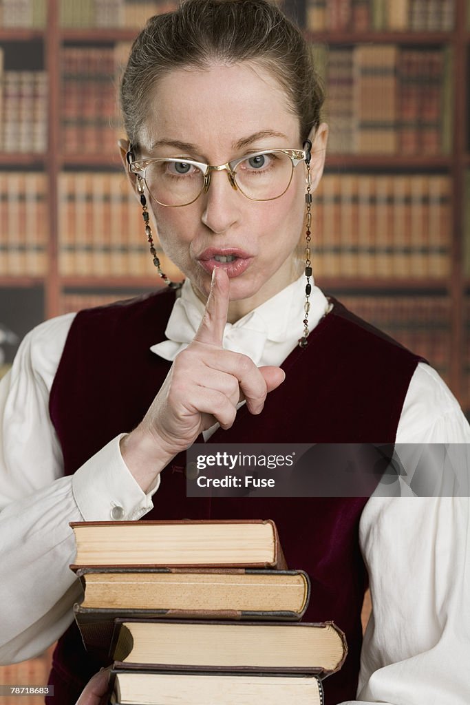 Library Shushing Sign Librarian Shushing High-Res Stock Photo - Getty Images