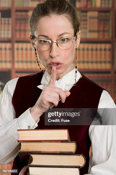 librarian shushing - librarian stock pictures, royalty-free photos & images