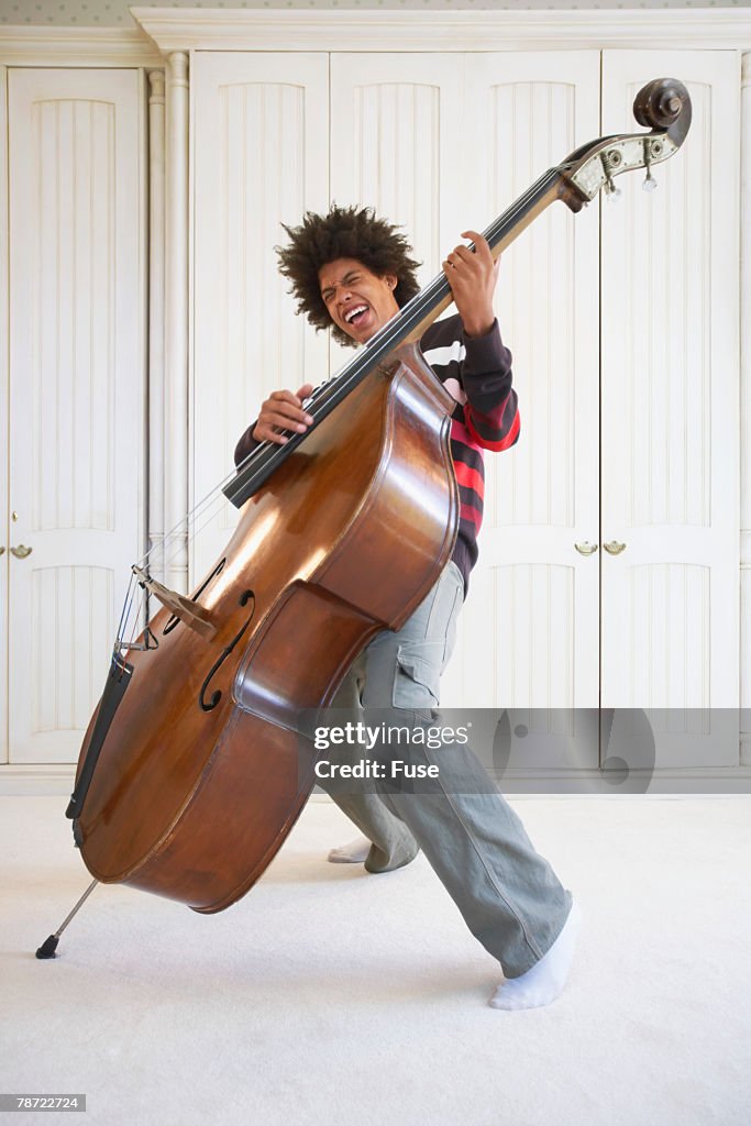 Teenage Boy Playing the Upright Bass