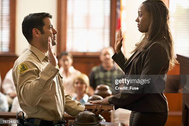 bailiff swears in witness - bailiff stock pictures, royalty-free photos & images