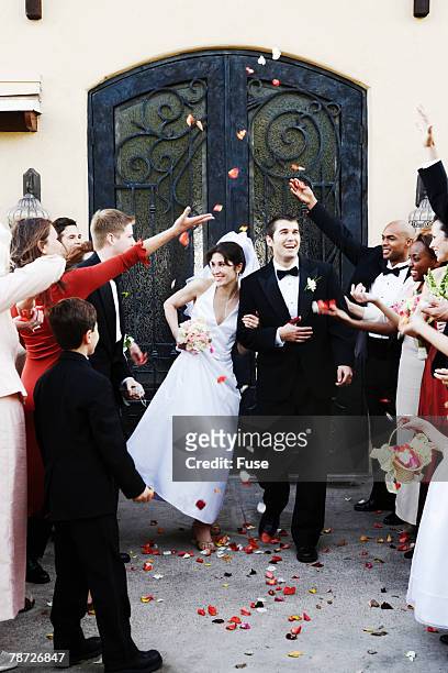 newlyweds leaving chapel - leaving church stock pictures, royalty-free photos & images