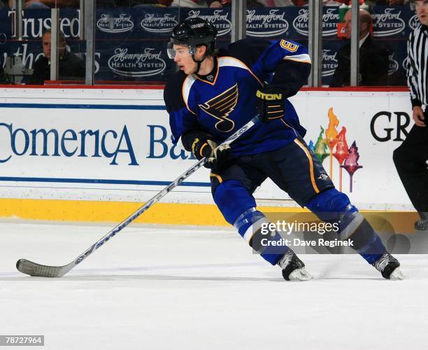 Eric Johnson of the St. Louis Blues turns with the puck during a NHL game against the Detroit Red Wings on December31, 2007 at Joe Louis Arena in...