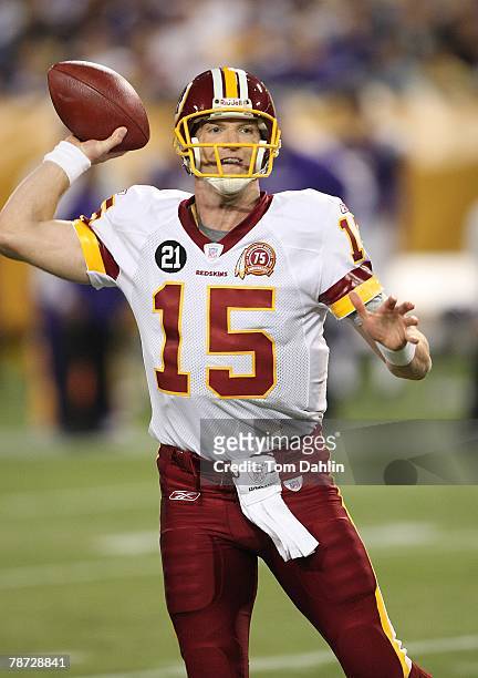 Todd Collins of the Washington Redskins passes during an NFL game against the Minnesota Vikings at the Hubert H. Humphrey Metrodome, December 23,...