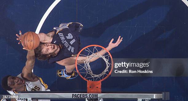 Pau Gasol of the Memphis Grizzlies battles Ike Diogu of the Indiana Pacers at Conseco Fieldhouse on January 2, 2008 in Indianapolis, Indiana. The...