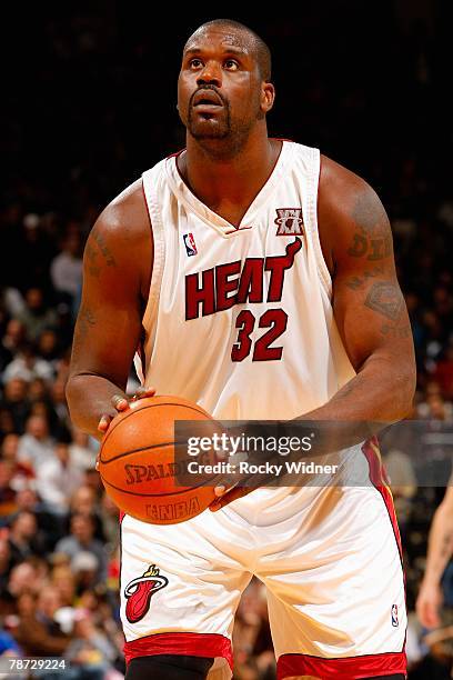 Shaquille O'Neal of the Miami Heat shoots a free throw during the game against the Golden State Warriors on December 7, 2007 at Oracle Arena in...