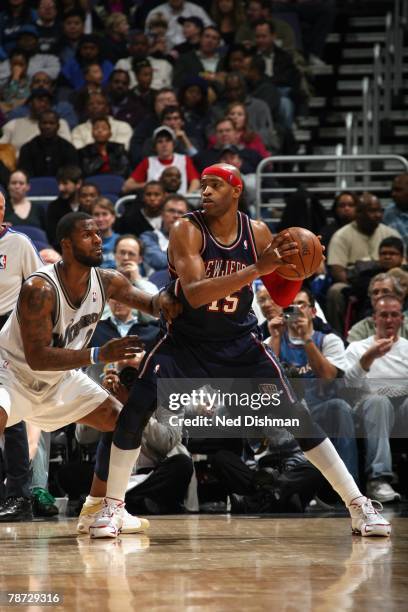 Vince Carter of the New Jersey Nets looks to move the ball against DeShawn Stevenson of the Washington Wizards during the game at the Verizon Center...