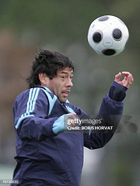 Former Boca Juniors Argentinian defender Juan Angel Krupoviesa joggles with a ball during a training camp with his French L1 football club Marseille...