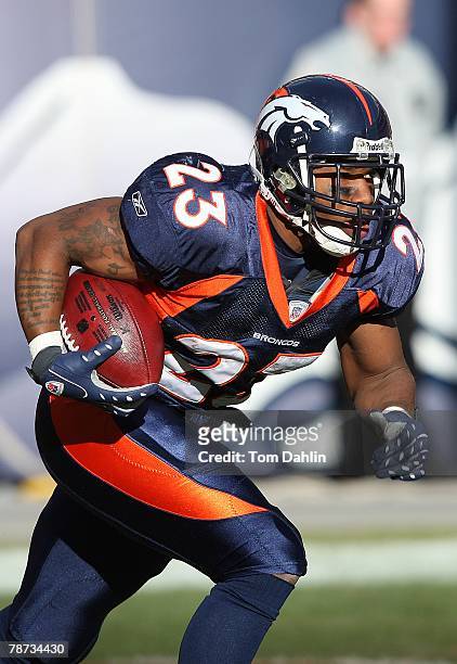 Running back Andre Hall of the Denver Broncos carries the ball at an NFL game against the Minnesota Vikings at Invesco Field at Mile High, on...