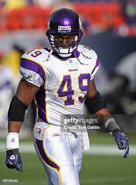 Running back Tony Richardson of the Minnesota Vikings looks to the sidelines during pre-game warm-ups at an NFL game against the Denver Broncos at...