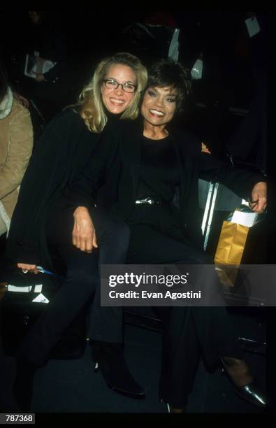 Eartha Kitt and daughter Kitt Shapiro sit backstage February 17, 1999 during the Marc Bouwer 1999 Fall Fashion Show in New York City. Fashion...