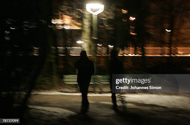 Young men walk by near Kieferngarten Underground Station on January 3, 2007 in Munich, Germany. After an elder man was attacked by juvenile criminals...