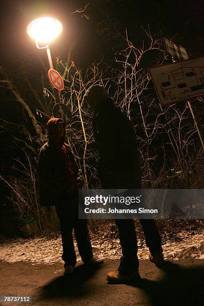 Young men chat together near Kieferngarten Underground Station on January 3, 2007 in Munich, Germany. After an elder man was attacked by juvenile...