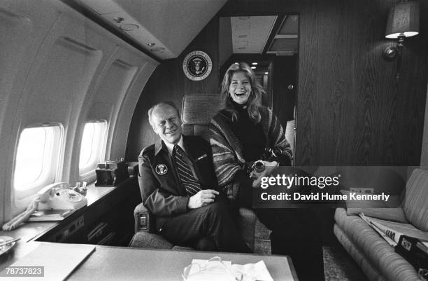Onboard Air Force One, President Ford poses with Candice Bergen, who was on a photo assignment for Ladies' Home Journal February 4, 1975 in Atlanta,...