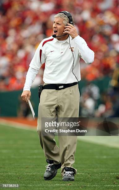 Head coach Pete Carroll of the USC Trojans reacts and takes off his radio headset during the game against the Illinois Fighting Illini in the Rose...