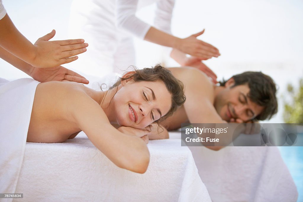 Man and Woman Receiving a Massage
