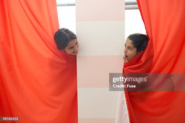 two teenage girls shopping - girl changing room shop stock-fotos und bilder