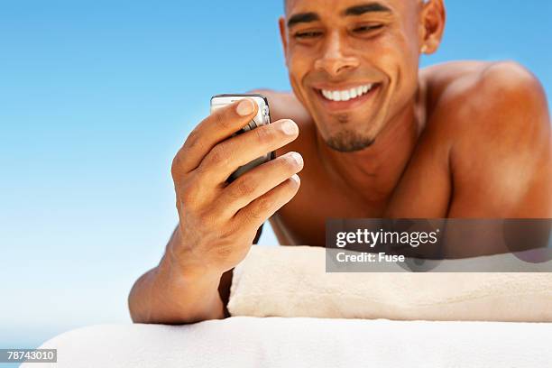 man on massage table - mobile massage table stock pictures, royalty-free photos & images