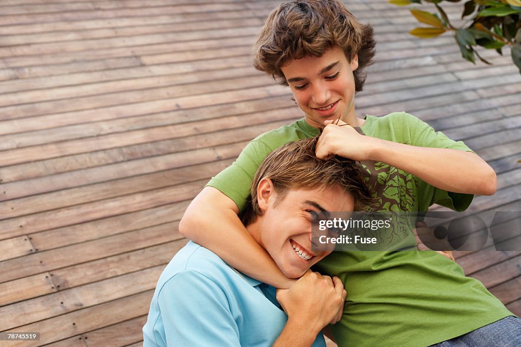 Two Teenagers Fighting For Fun High Res Stock Photo Getty Images two-teenagers-fighting-for-fun-high-res-stock-photo-getty-images
