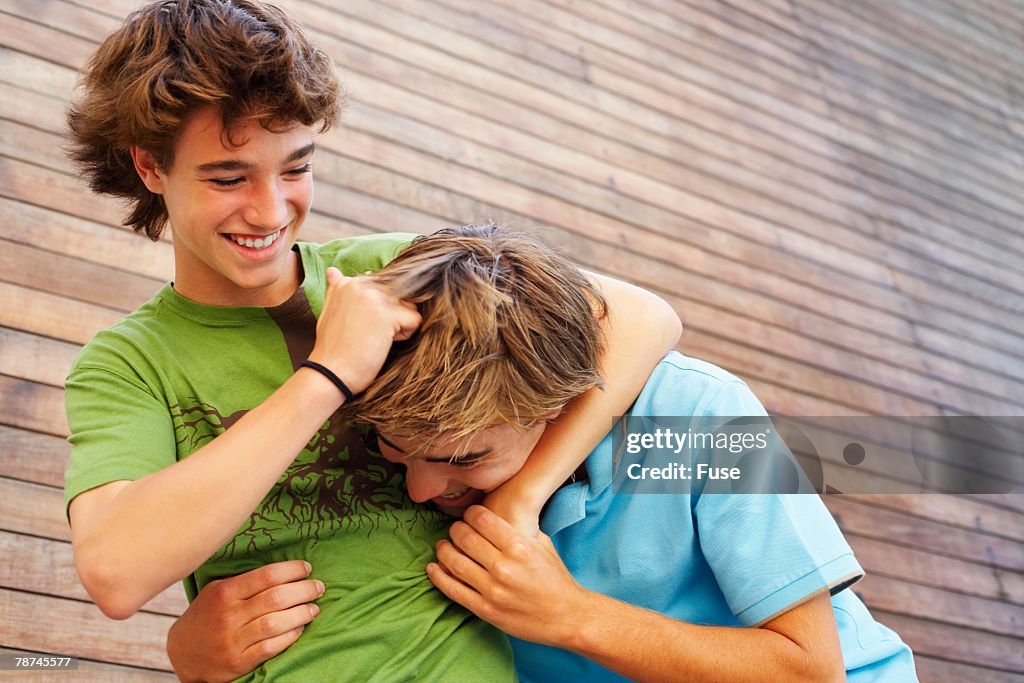 Two Teenagers Fighting For Fun High Res Stock Photo Getty Images two-teenagers-fighting-for-fun-high-res-stock-photo-getty-images