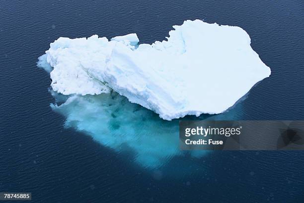 iceberg seen above and below water - iceberg above and below water stock pictures, royalty-free photos & images