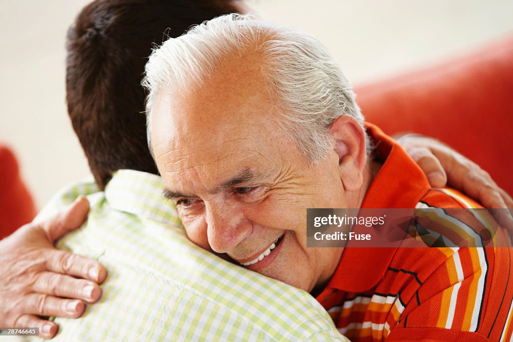 Father and Adult Son Embracing