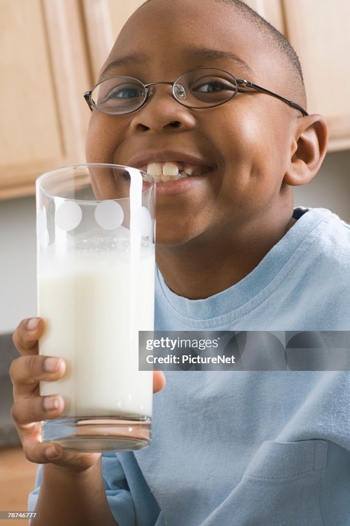 Boy with Large Glass of Milk