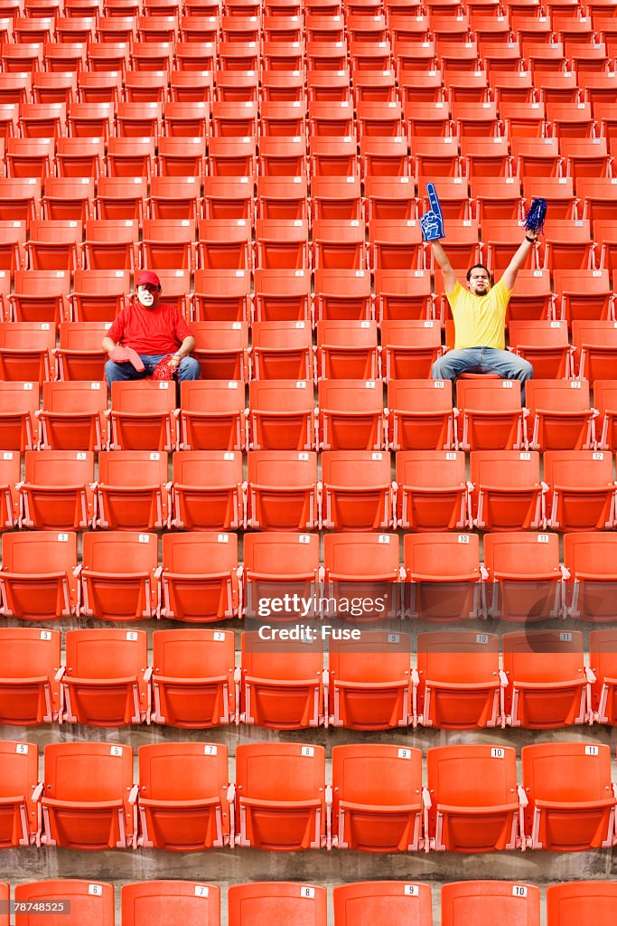 Two Sports Fans in Stadium
