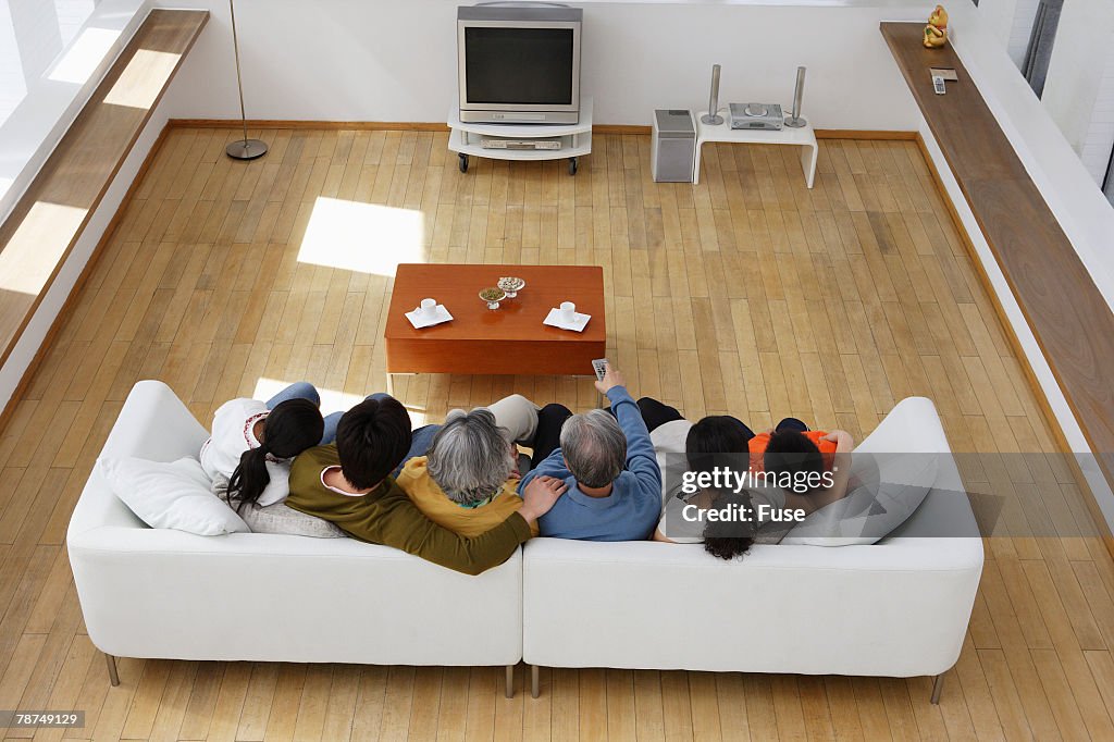 Multigenerational Family Watching Television