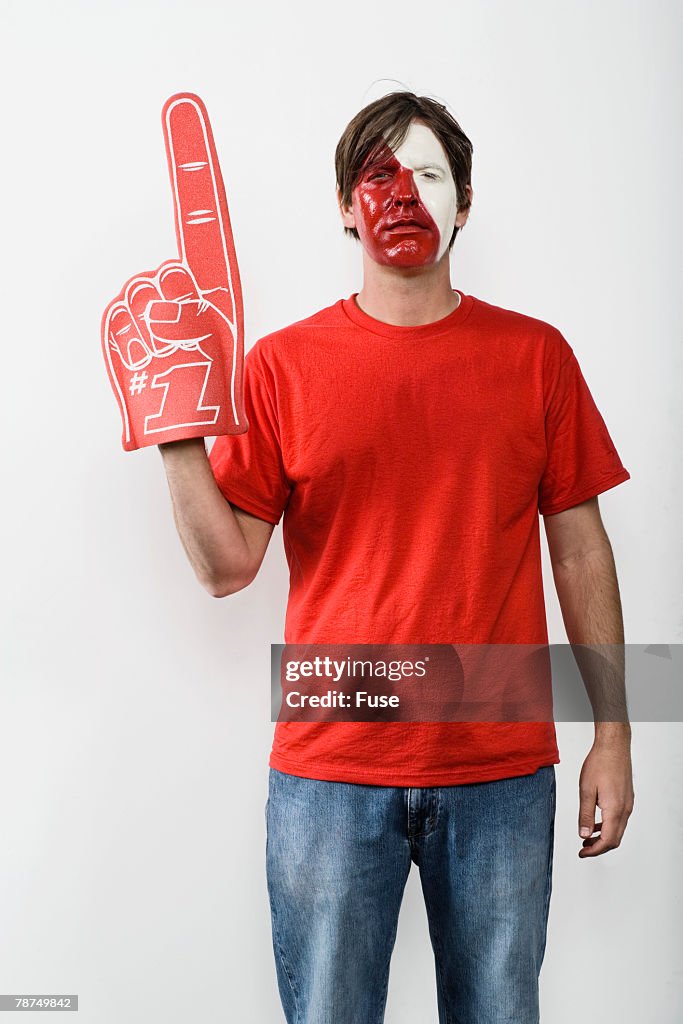 Young Man with Foam Rubber Finger