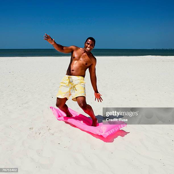 Guy On Inflatable Raft 76 Raft Matching Stock Photos, High-Res Pictures, and Images - Getty Images