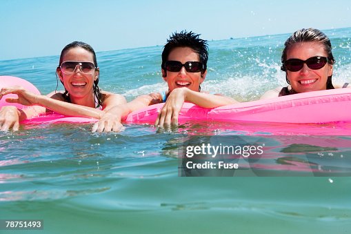 Women On A Raft High-Res Stock Photo - Getty Images