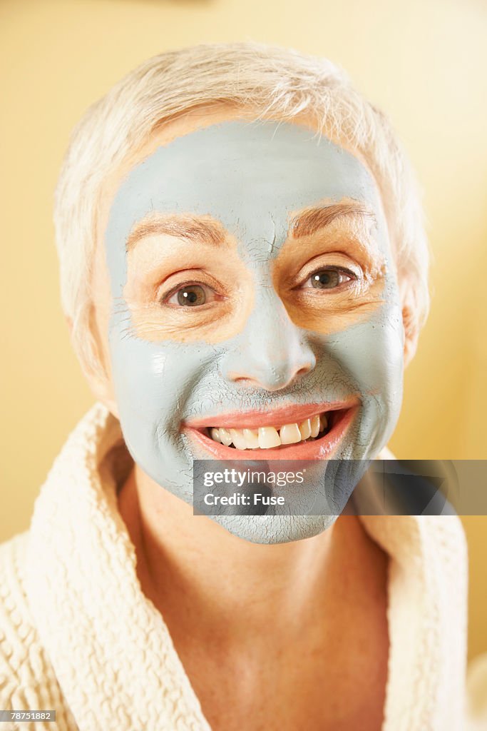 Smiling Woman with Facial Mask