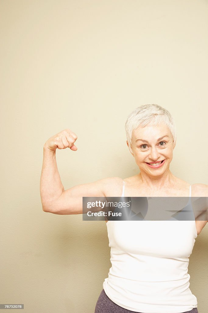 Woman Flexing Her Biceps