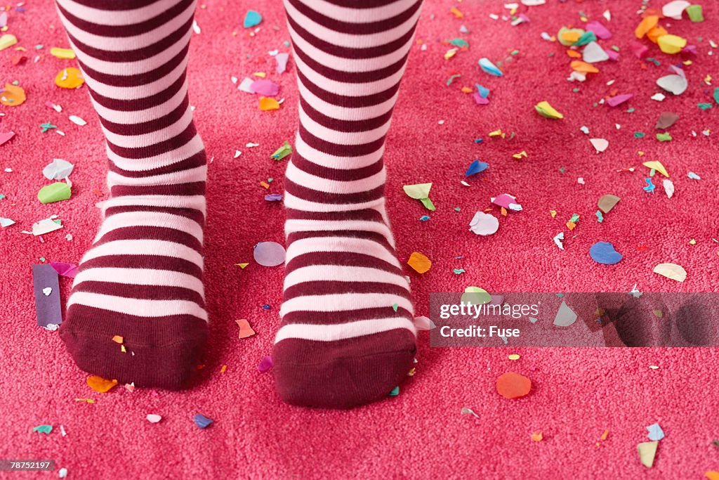 Feet of Girl in Striped Socks