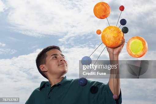 Student with Model Solar System Student with Model Solar System