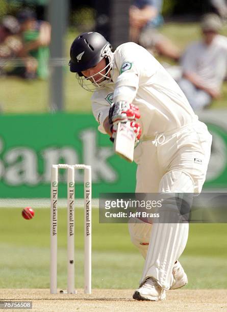 Matthew Bell of New Zealand drives during day one of the the First Test match between New Zealand and Bangladesh at the University Oval January 4,...