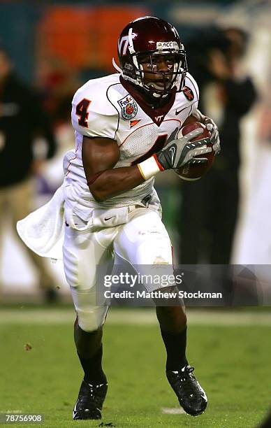 Eddie Royal of the Virginia Tech Hokies carries the ball during the FedEx Orange Bowl against the Kansas Jayhawks at Dolphin Stadium on January 3,...