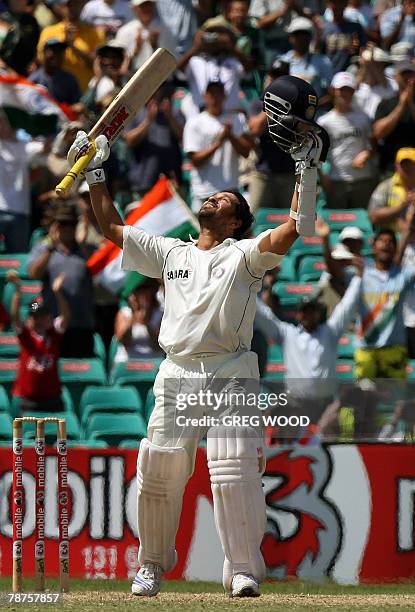 India's Sachin Tendulkar looks skyward after reaching his century on day three of the second test match at the Sydney Cricket Ground, 04 January...