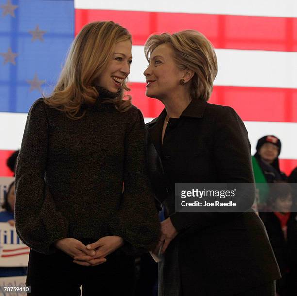 Democratic presidential candidate Sen. Hillary Clinton and her daughter Chelsea Clinton stand together during a campaign stop at Aeroservices, Inc....