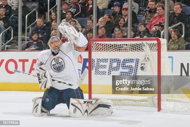 Goaltender Dwayne Roloson of the Edmonton Oilers makes a save against the Columbus Blue Jackets on December 31, 2007 at Nationwide Arena in Columbus,...