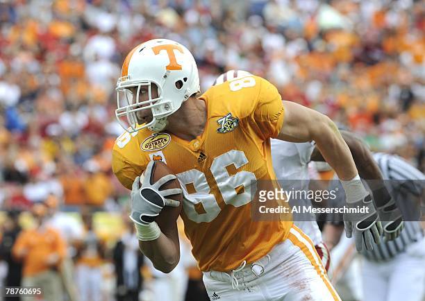 Tight end Brad Cottam of the Tennessee Volunteers rushes with a pass against the Wisconsin Badgers in the 2008 Outback Bowl at Raymond James Stadium...