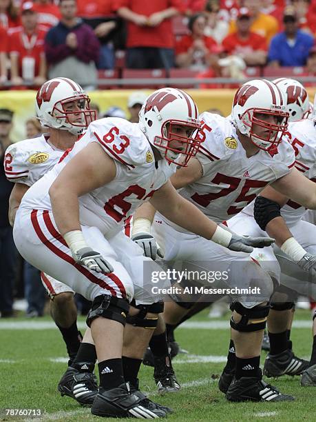 Offensive lineman Kraig Urbik of the Wisconsin Badgers sets to block against the Tennessee Volunteers in the 2008 Outback Bowl at Raymond James...