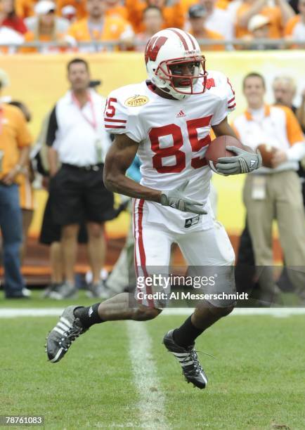 Wide receiver David Gilreath of the Wisconsin Badgers rushes upfield against the Tennessee Volunteers in the 2008 Outback Bowl at Raymond James...